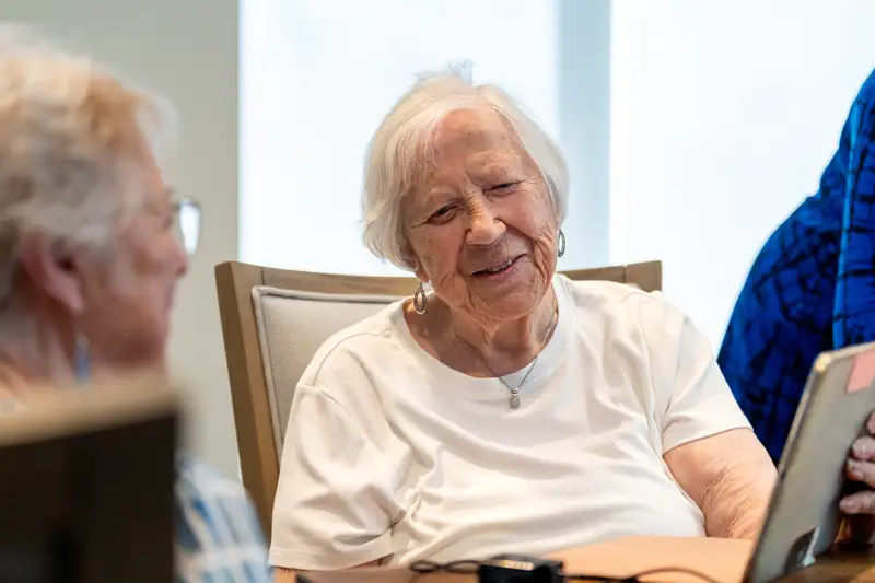 Residents engaging in a social activity in a common area