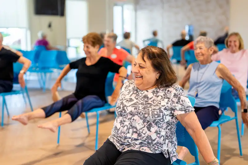Residents participating in a group exercise class