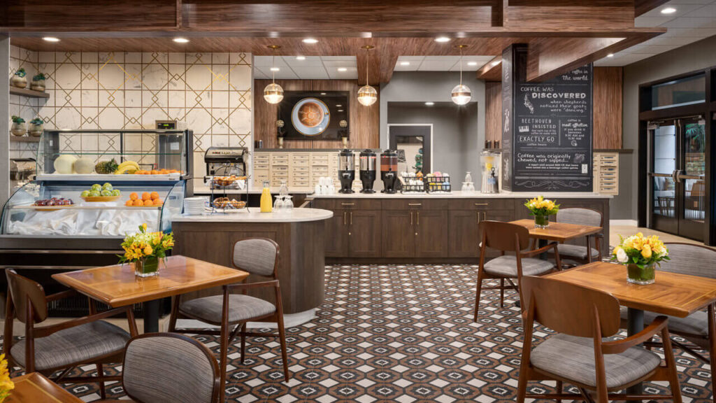 Dining area with tables and a coffee station