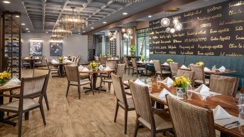 Bright dining area with tables set for meals