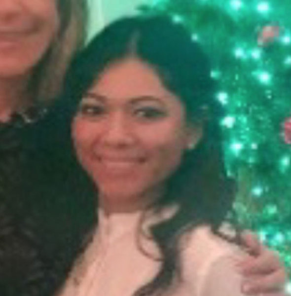 Two individuals smiling together