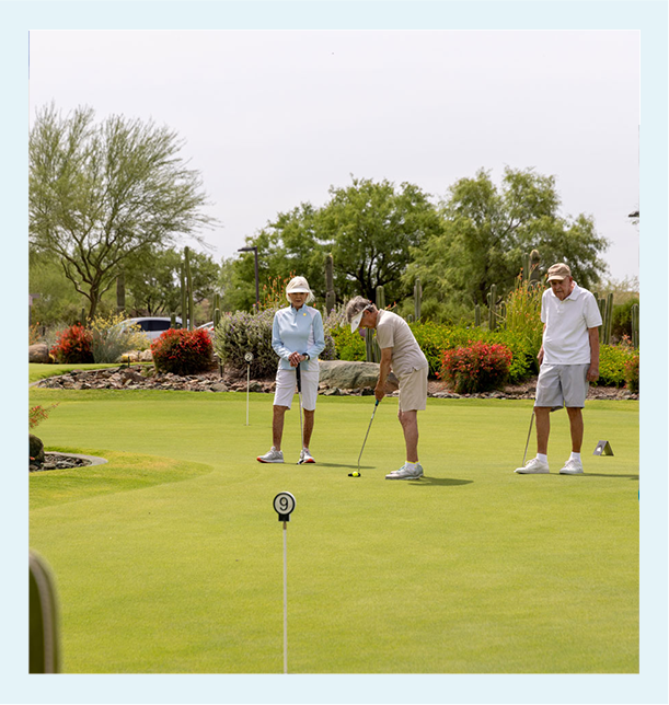 Residents enjoying a game of golf outdoors