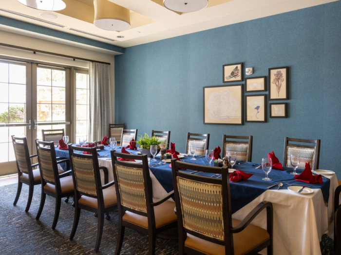 A dining room set for a meal with elegant decor