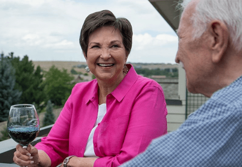 Residents enjoying the outdoor space with drinks