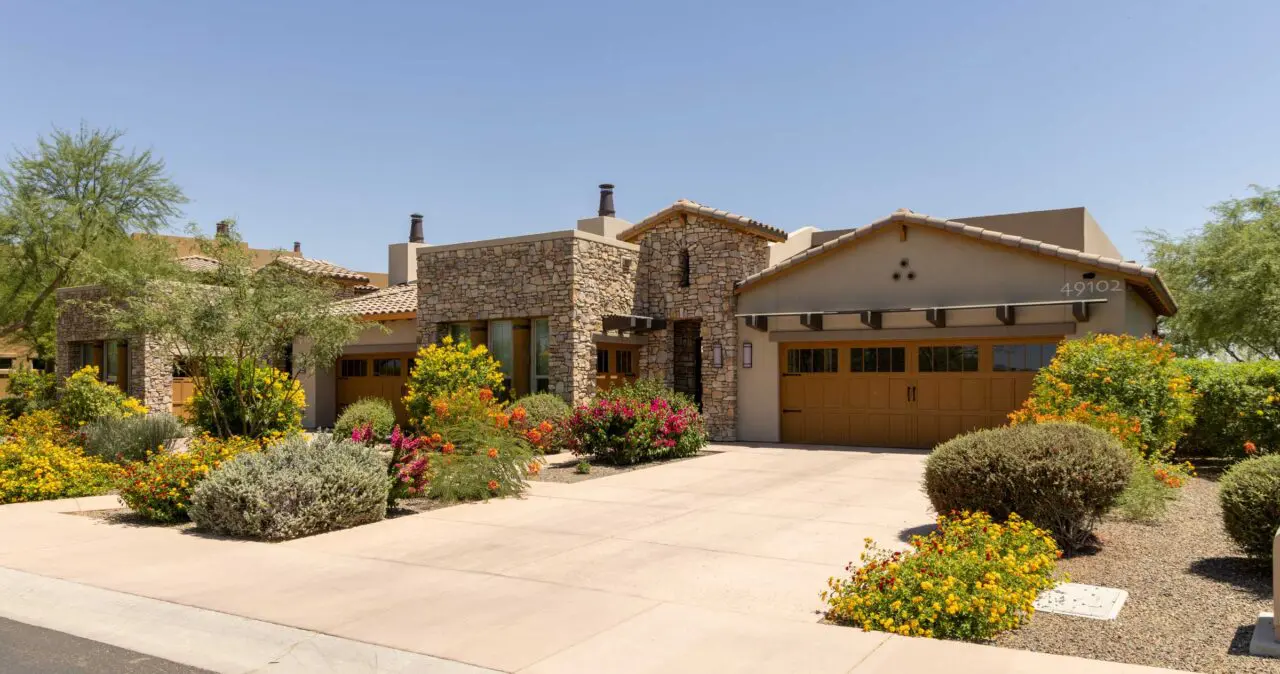 Exterior view of a residential building with landscaping