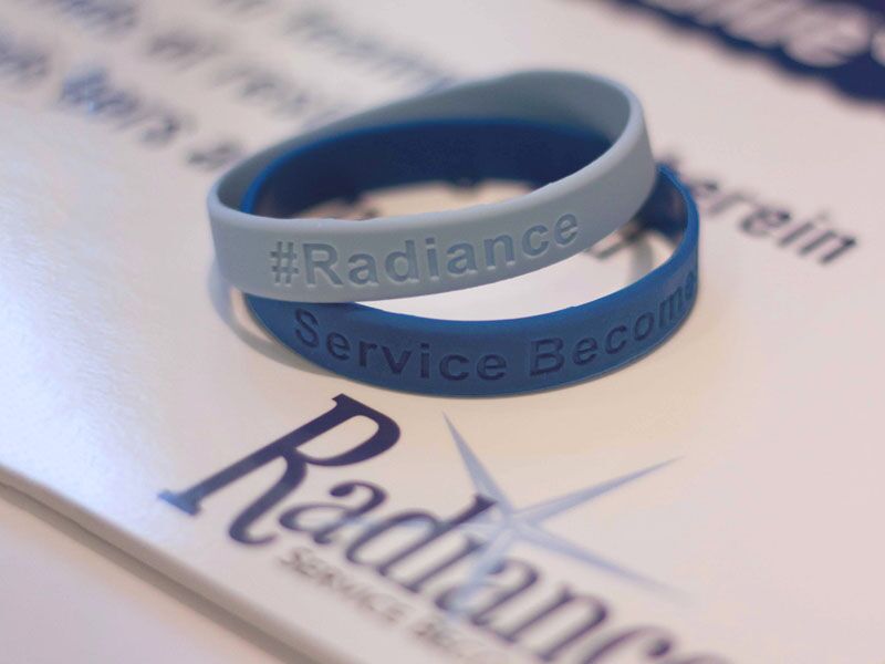 Radiance service wristbands on a surface
