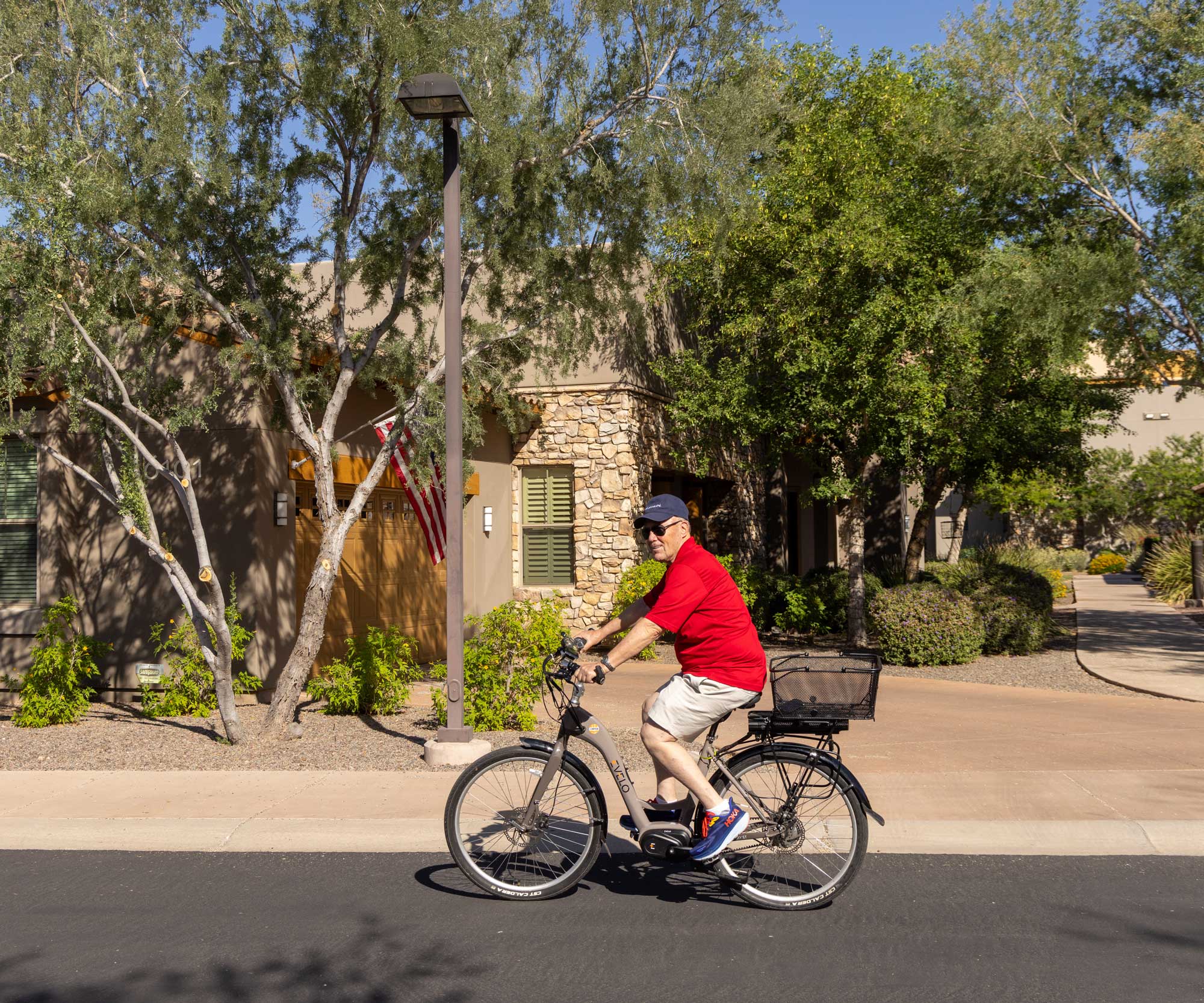 Resident biking in the facility's outdoor area