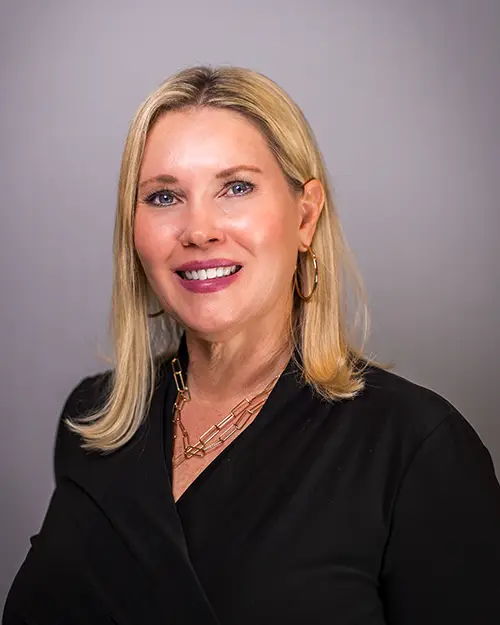 Woman smiling in a professional setting