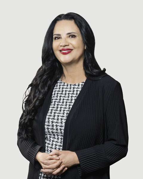 Professional portrait of a woman in a black jacket