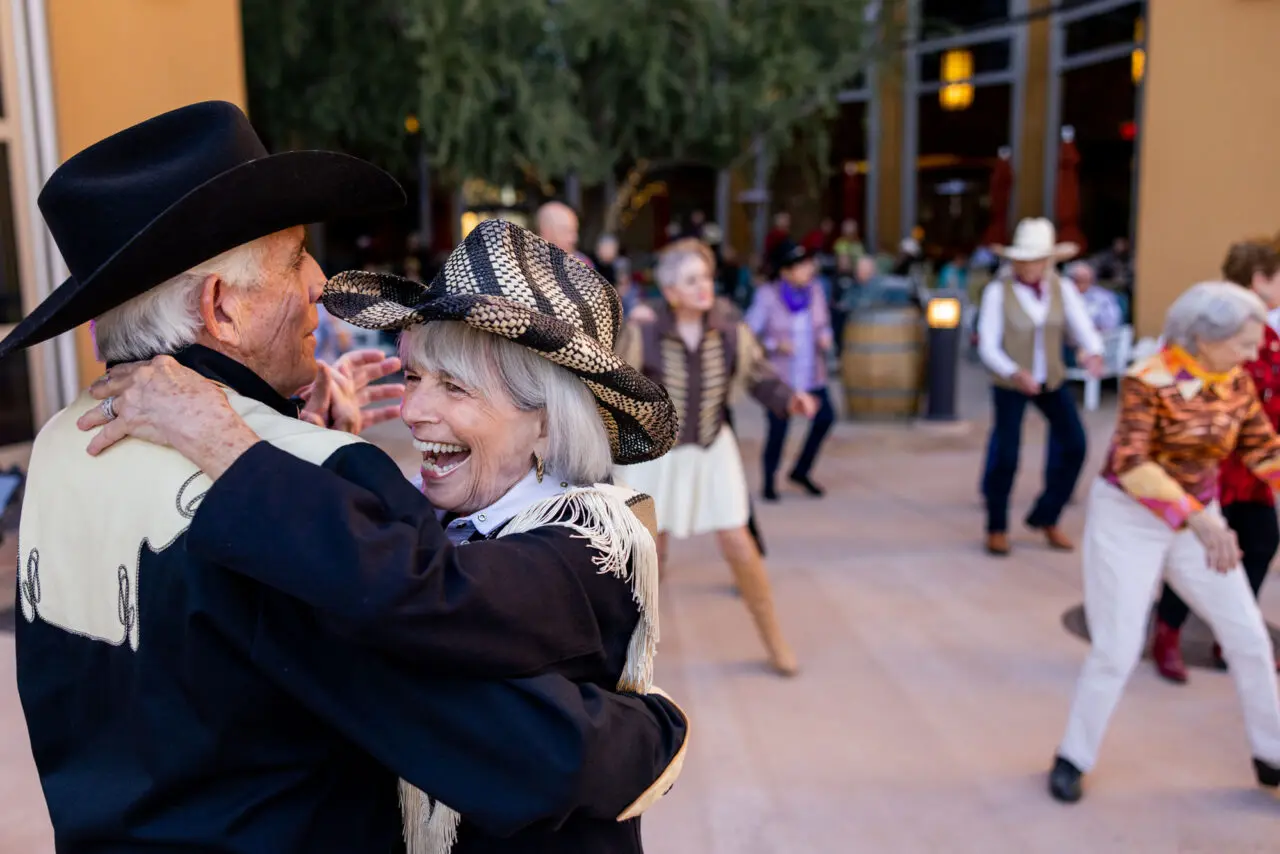 Residents enjoying a lively dance event outdoors