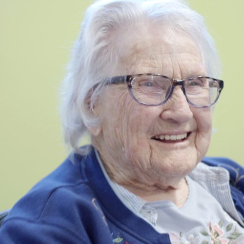 Cheerful elderly woman smiling