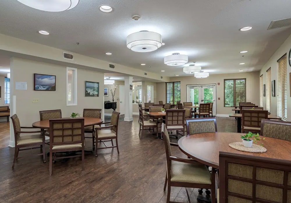 Interior common area with dining tables and chairs