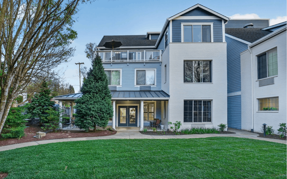 Exterior view of Hawthorne Gardens with landscaped area.