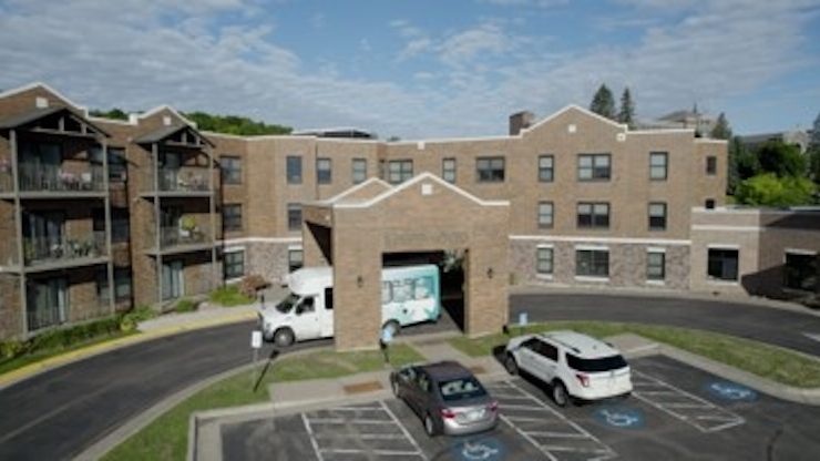 Exterior view of the facility and parking area.