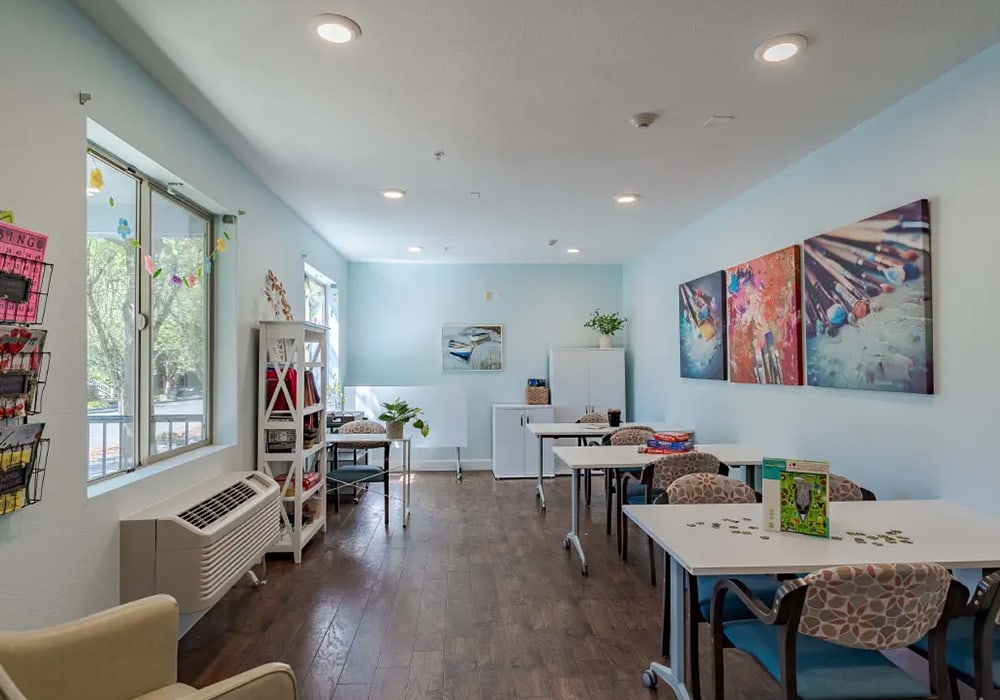 Bright and inviting common area with seating and decor.