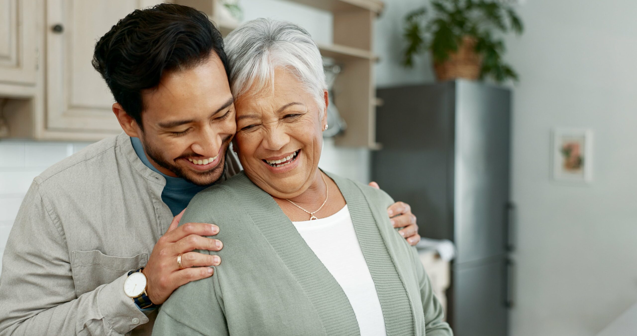 Senior woman enjoying time with younger man