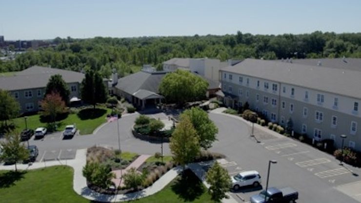 Aerial view of Cerenity Humboldt's exterior and landscaping.
