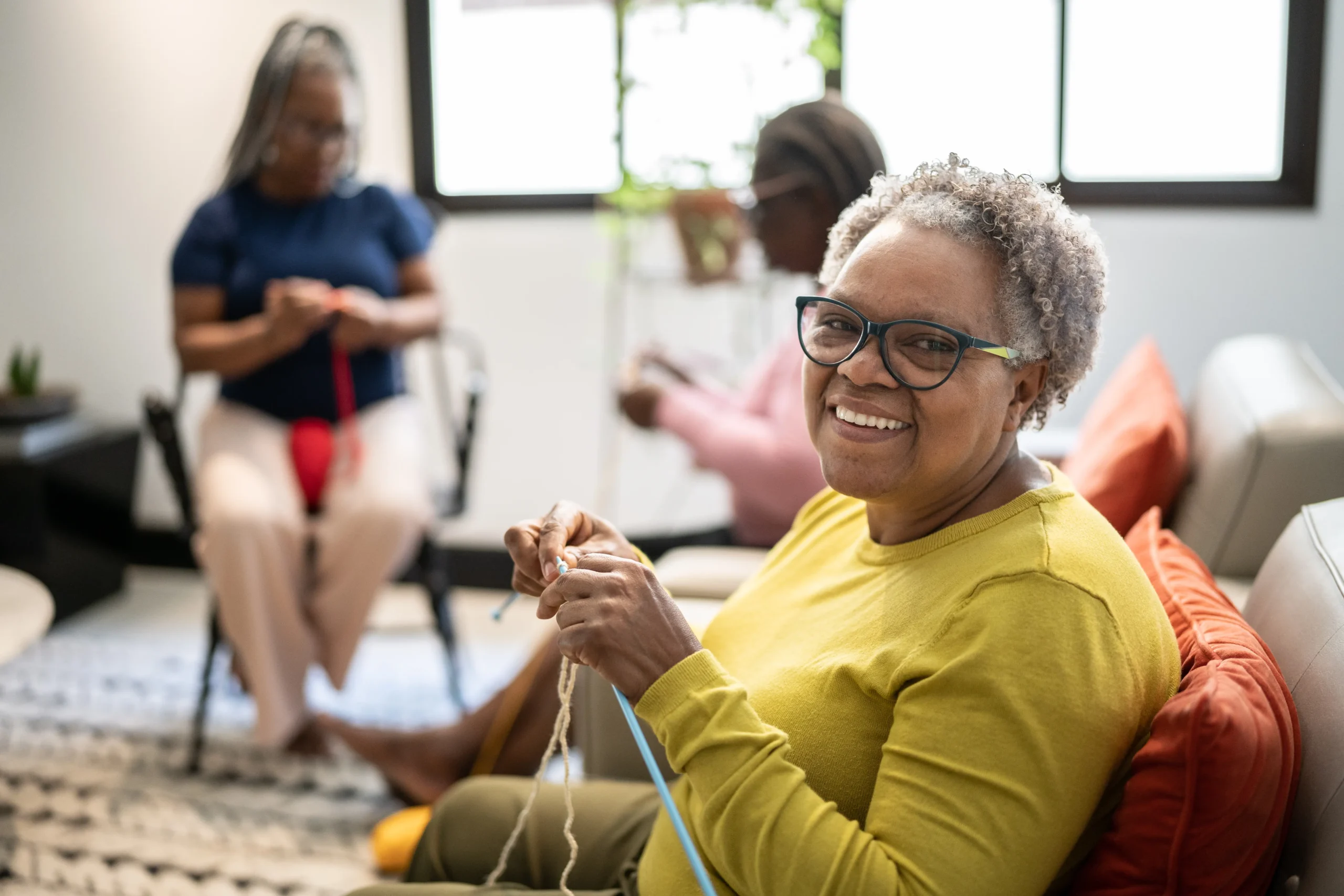 Resident engaging in a knitting activity