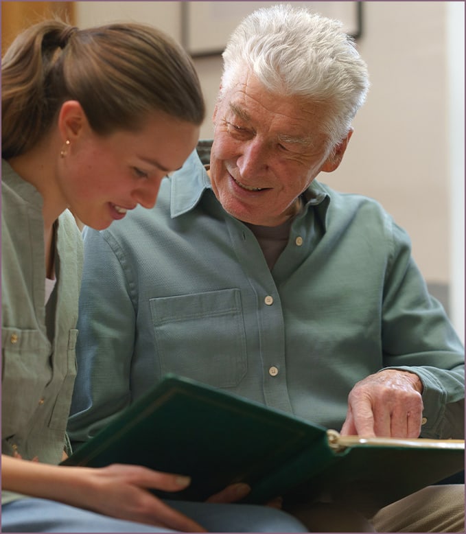 Engaging interaction between a resident and a staff member.