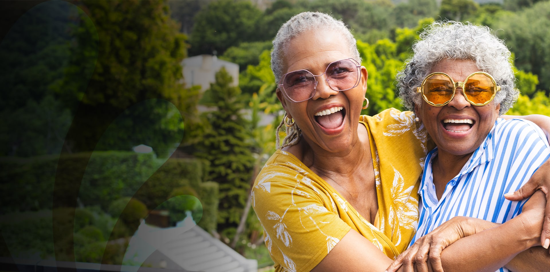Two joyful seniors enjoying time outdoors.