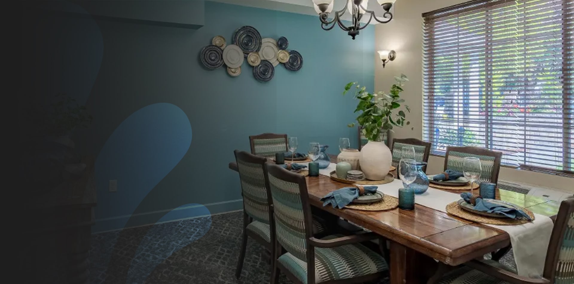 Dining room with a wooden table and decorative features.