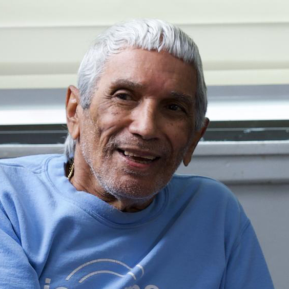 Smiling resident in casual clothing indoors