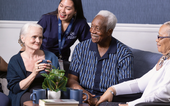 Residents enjoying time together with staff.