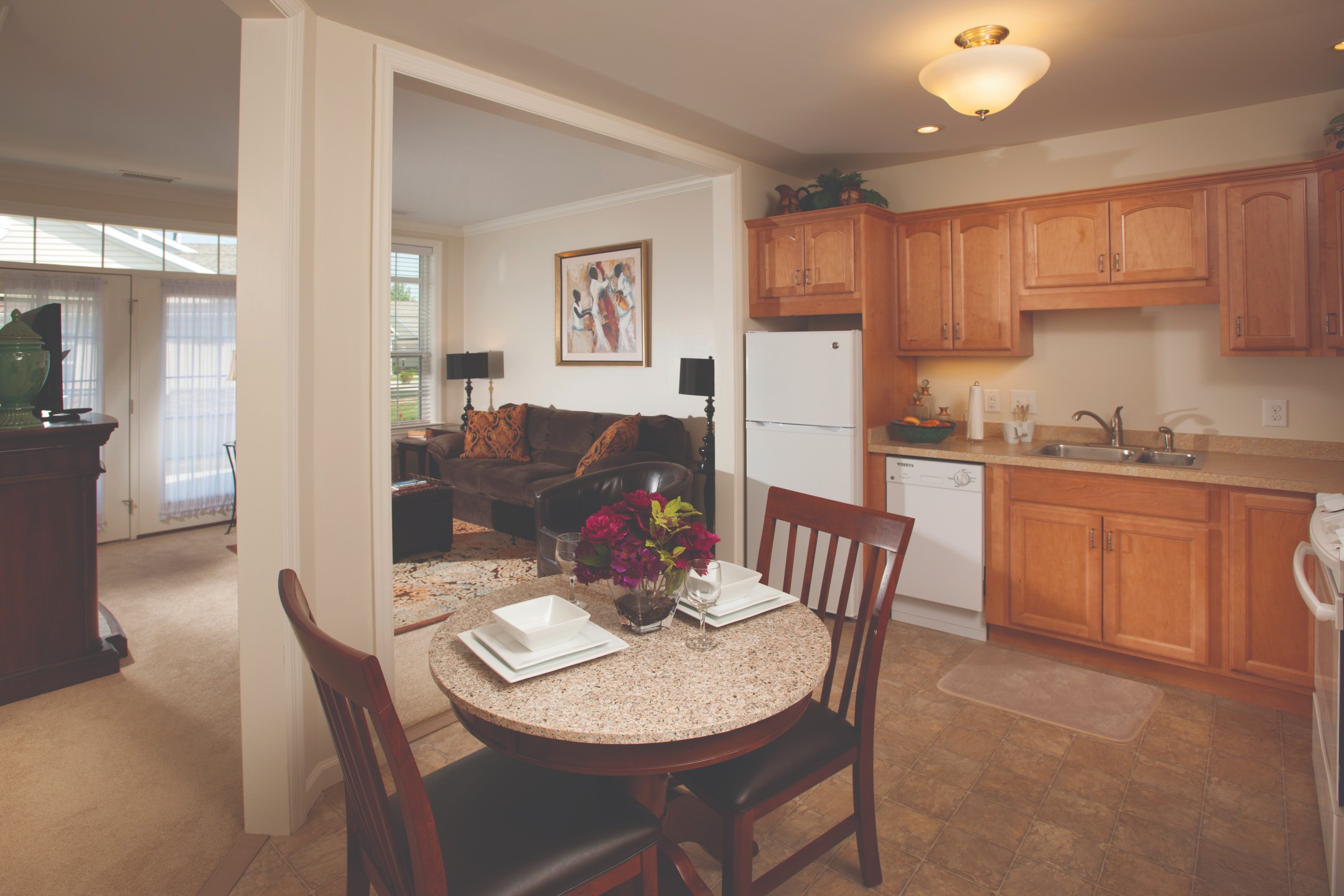 Cozy kitchen and living area in a senior apartment