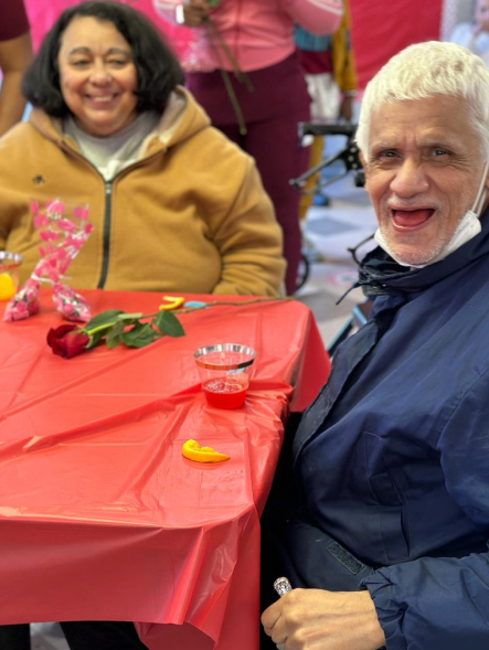 Residents enjoying an activity at a table