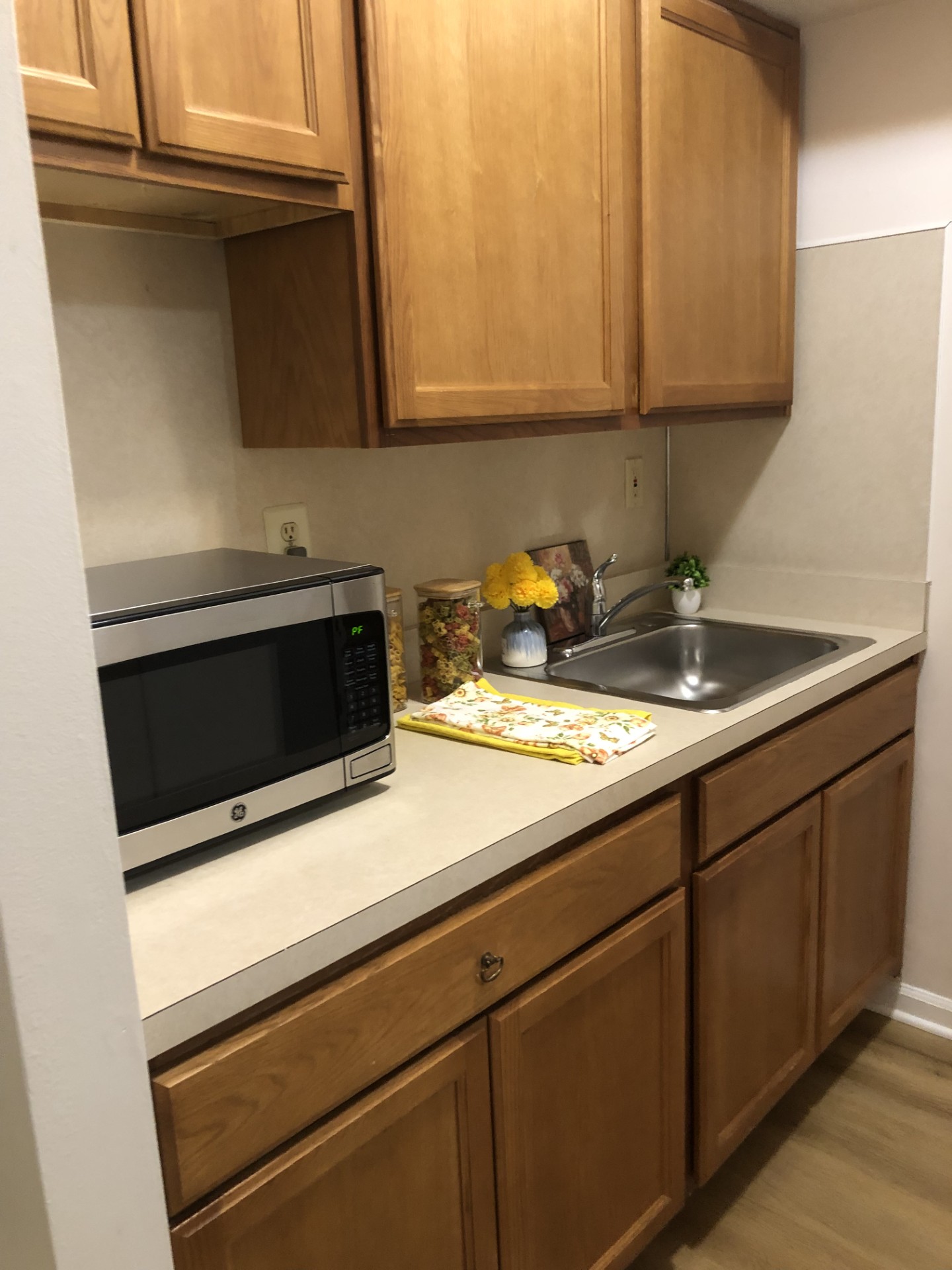 Interior kitchenette with microwave and sink