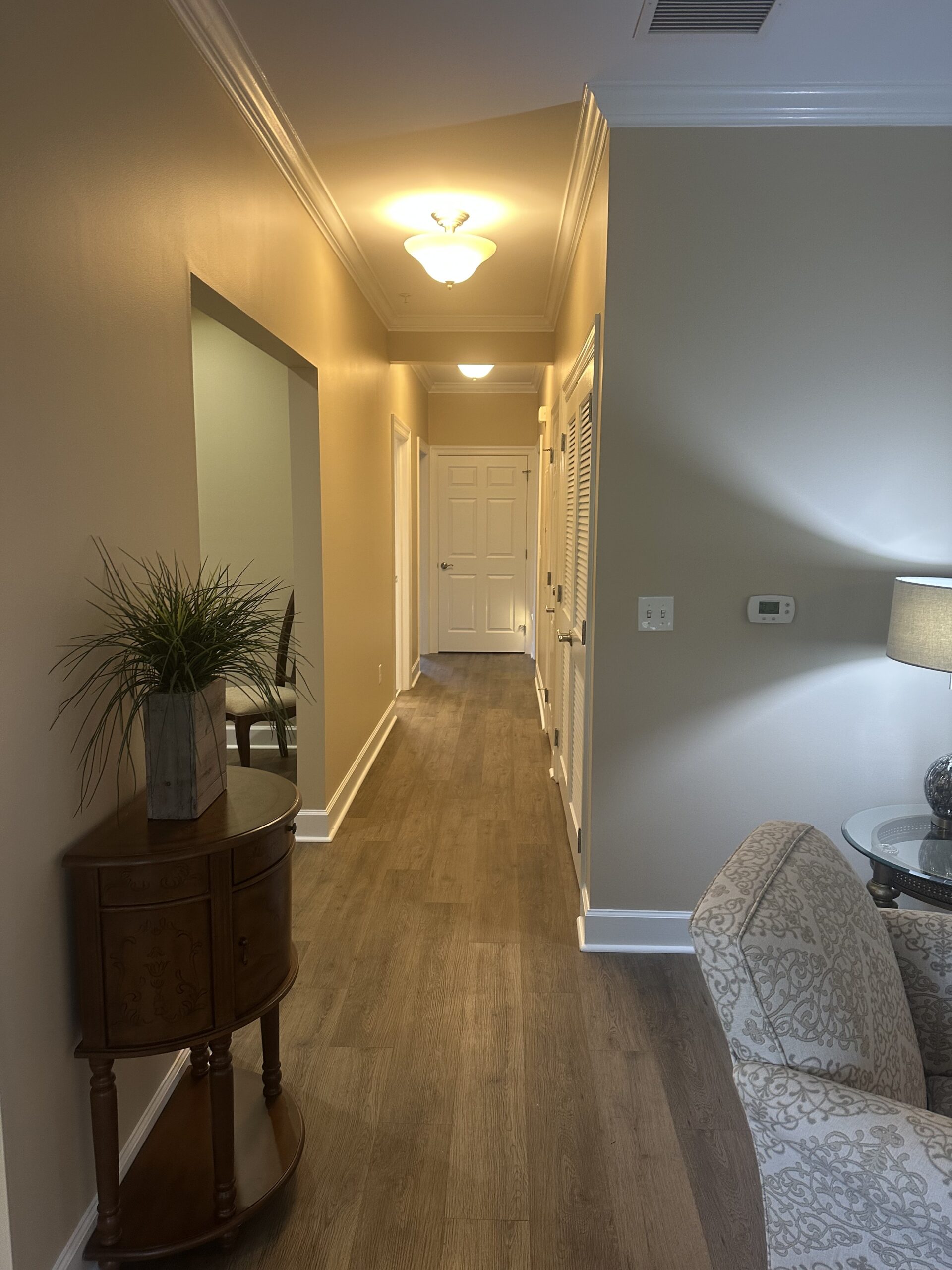 Interior hallway with light and furnishings
