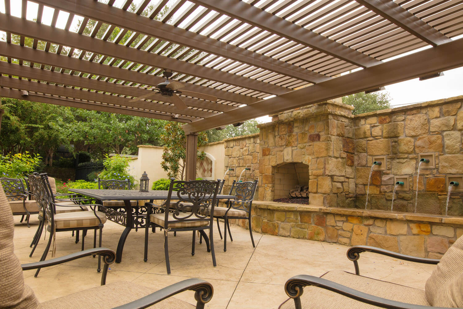 Outdoor seating area with stone fountain