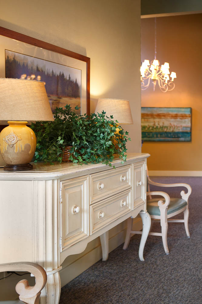 Cozy interior decor with lamps and artwork