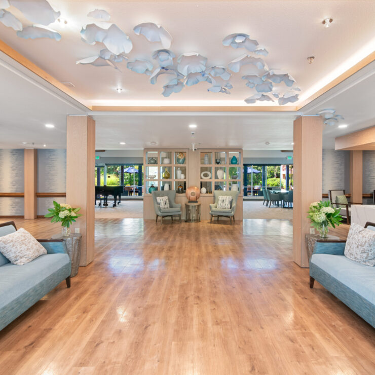 Bright common area with blue decor and seating
