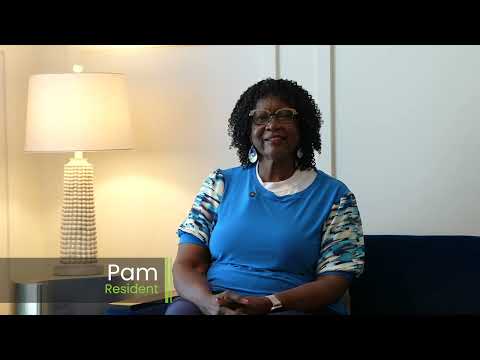 A resident named Pam sitting in a common area