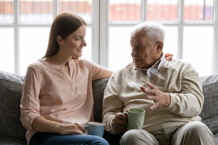 A caregiver and resident enjoying a conversation