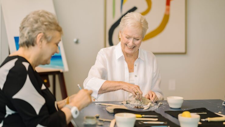 Residents engaged in a craft activity together