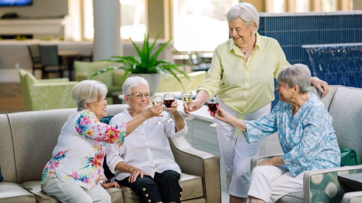Residents enjoying drinks together in a common area