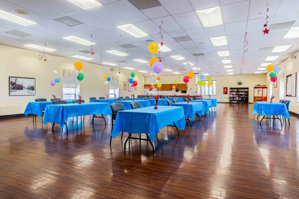Bright activity room with festive decorations for an event