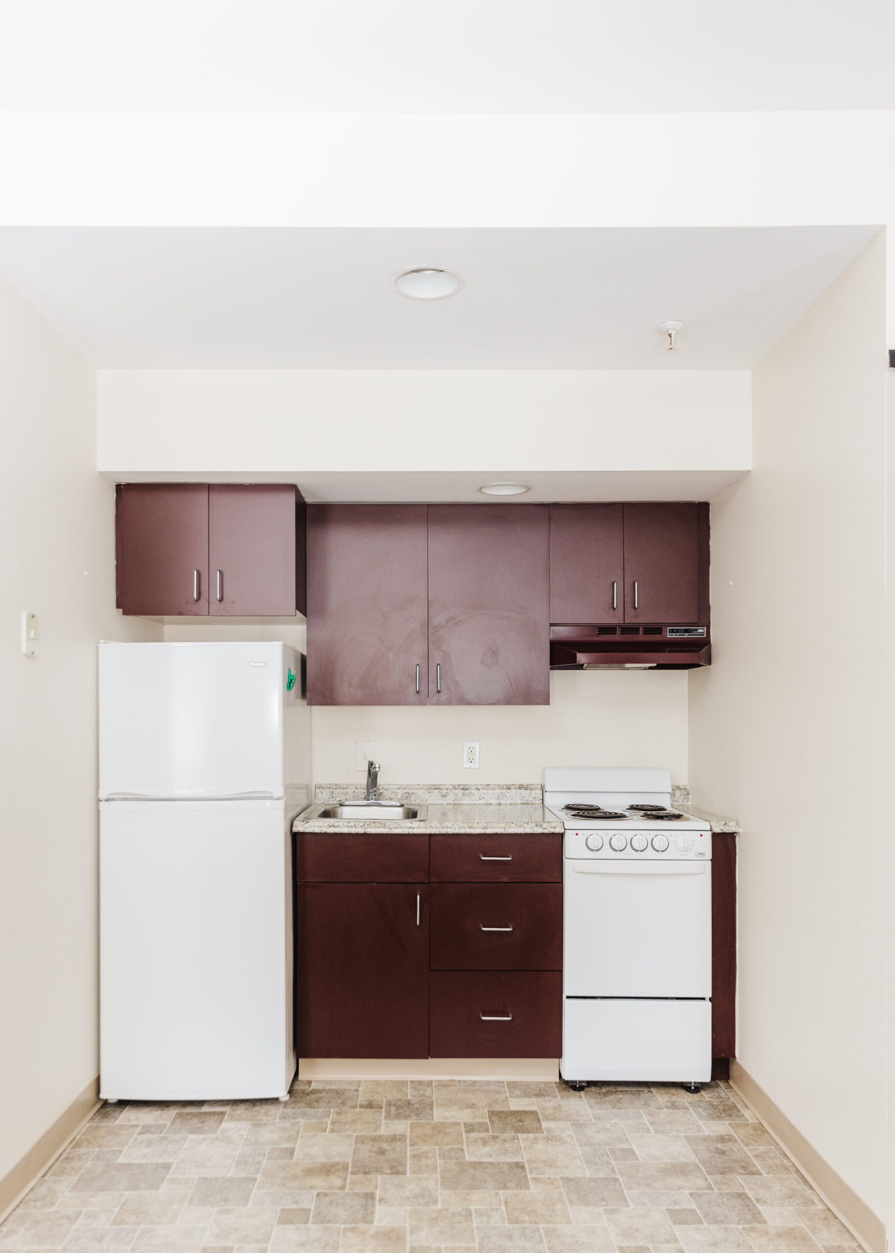 Compact kitchen area in a senior living space