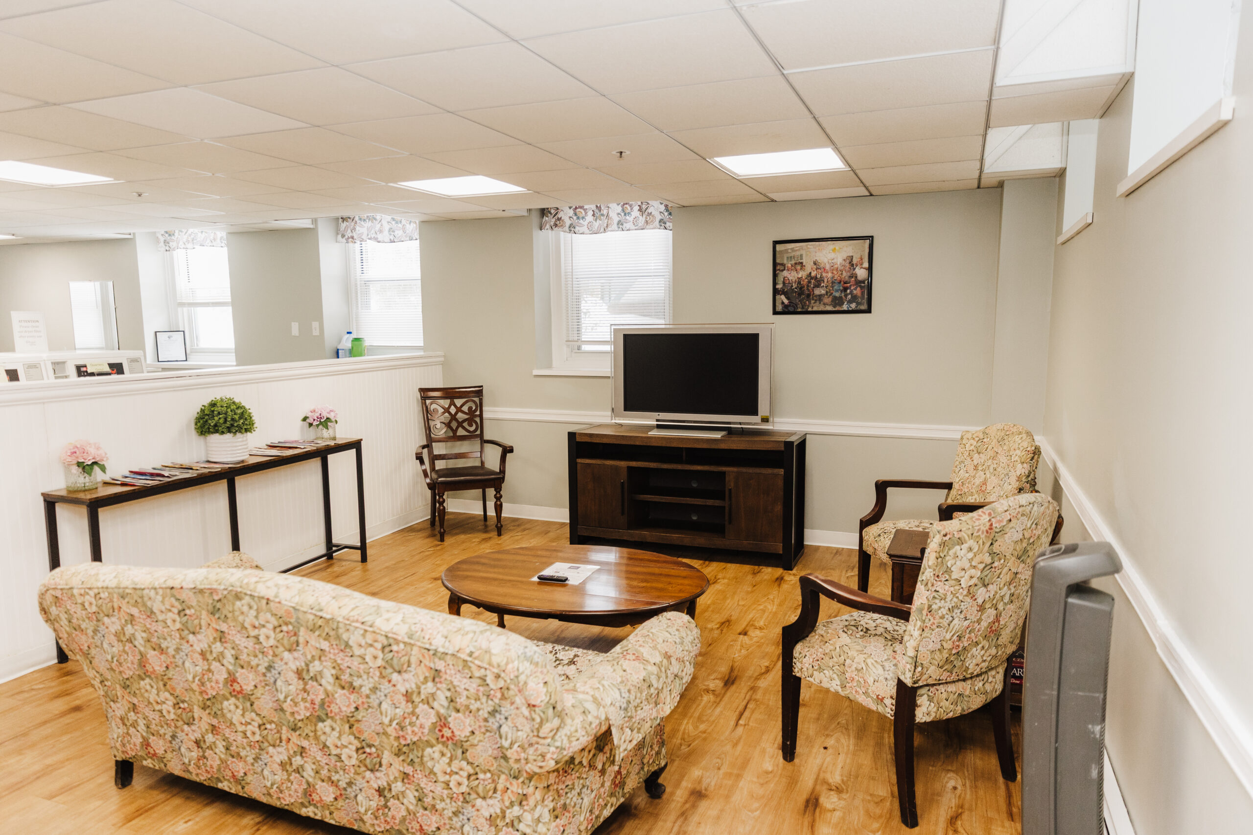 Interior common area with seating and television