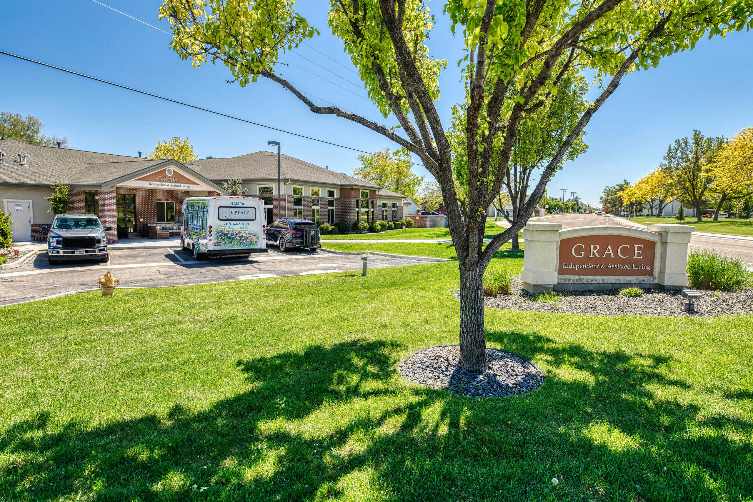 Exterior view of Grace Assisted Living facility with signage