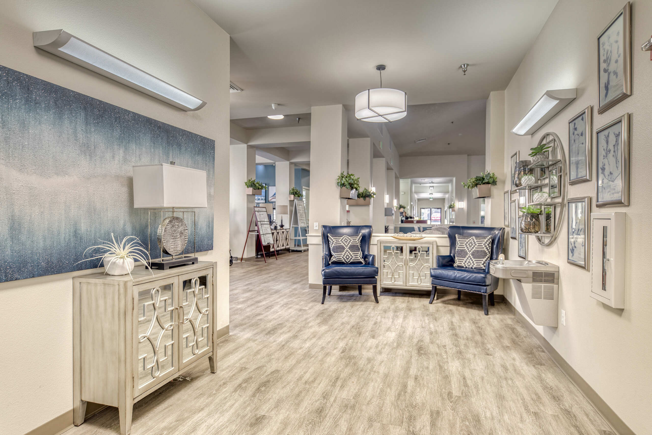 Bright interior common area with seating and decor