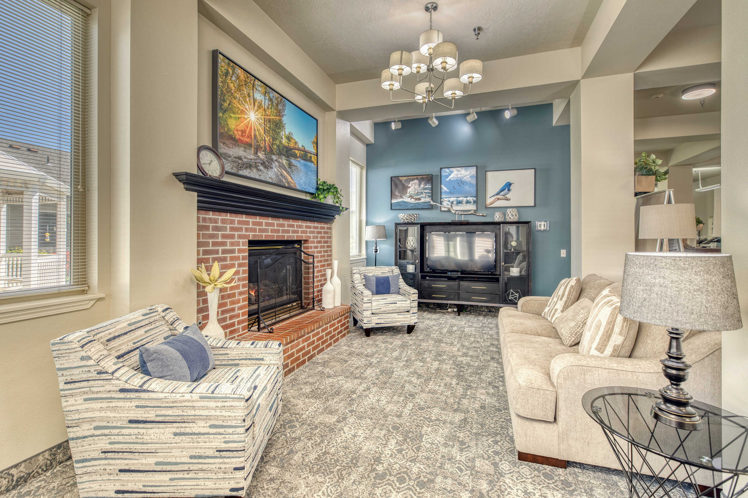 Bright common area with seating and artwork