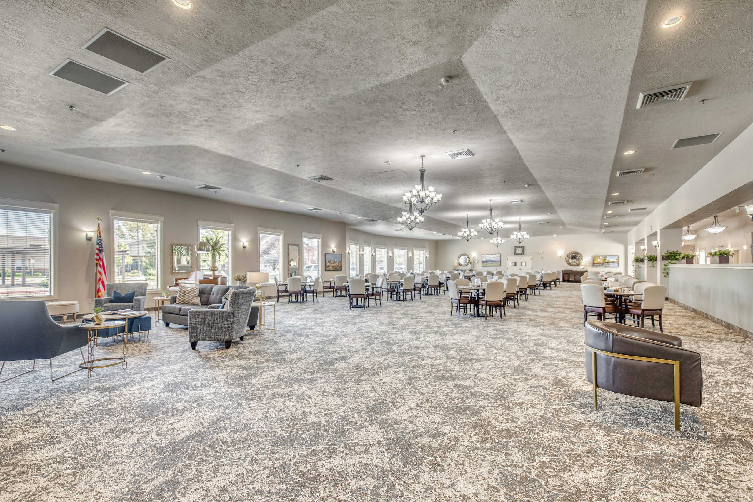 Spacious common area with seating and dining spaces