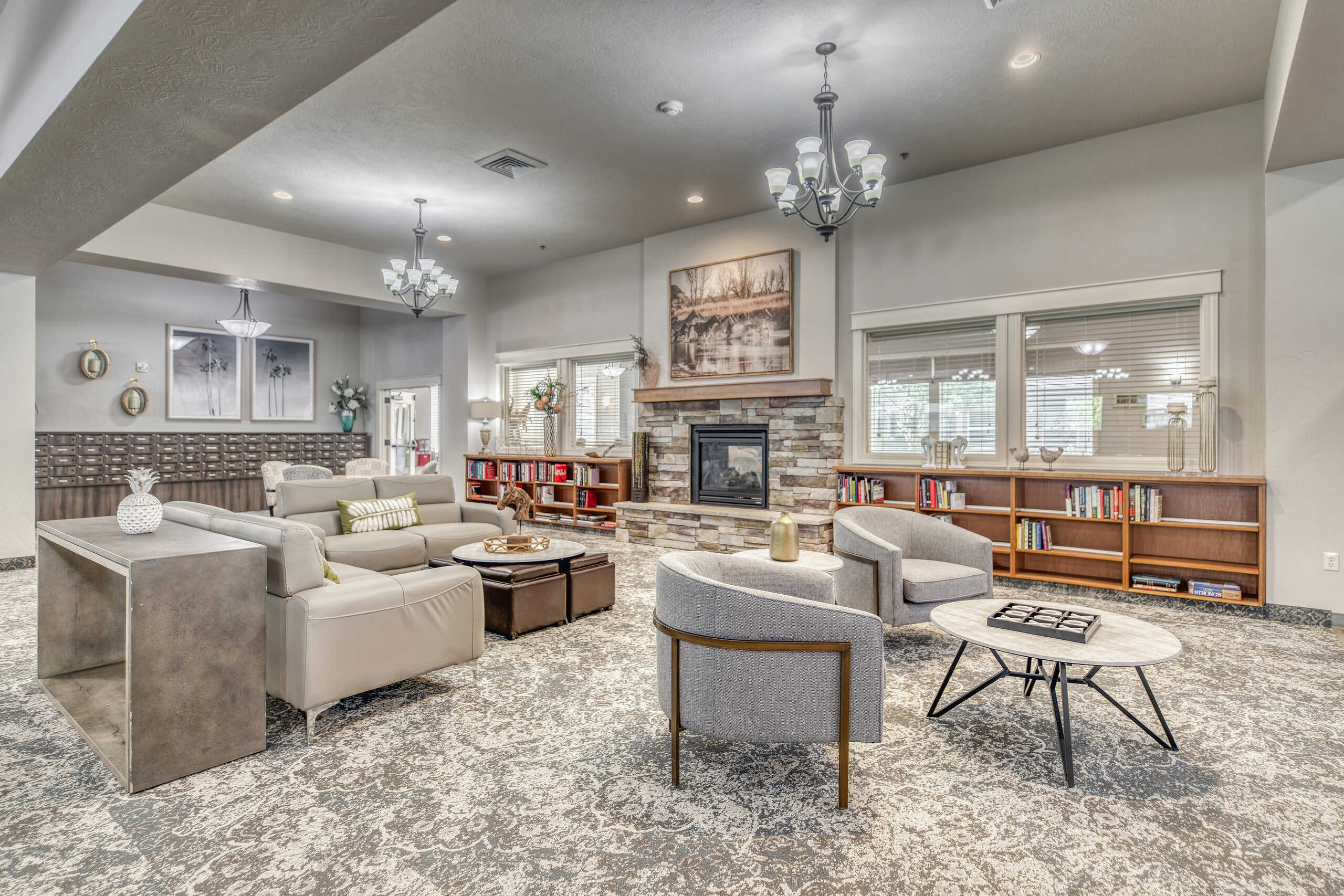 Cozy common area with seating and bookshelves