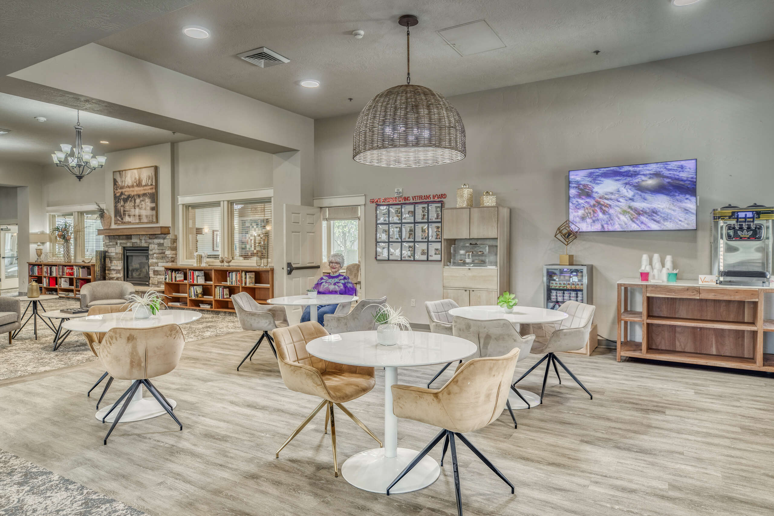 Interior common area with seating and a resident