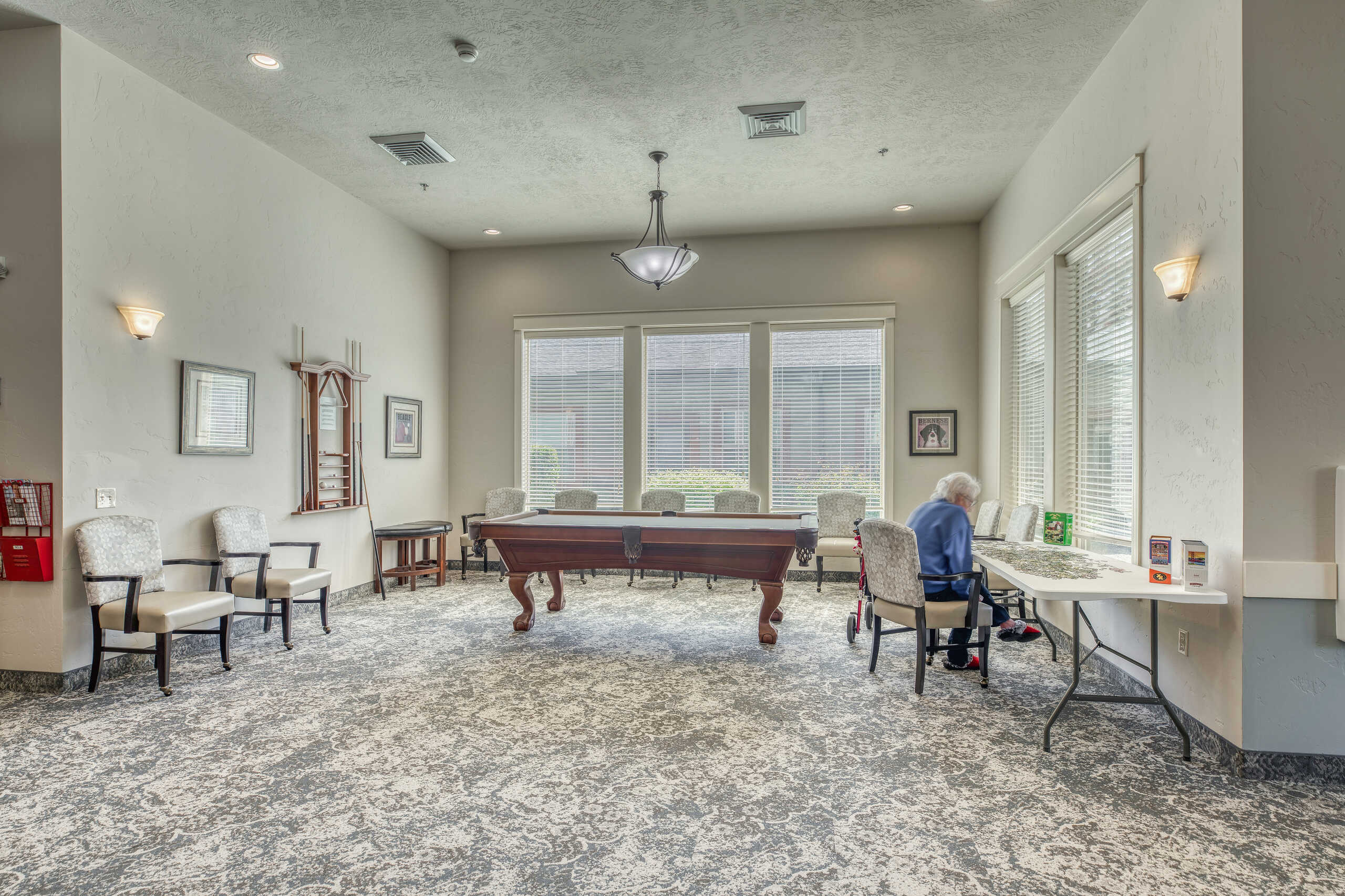 Common area with billiards table and resident