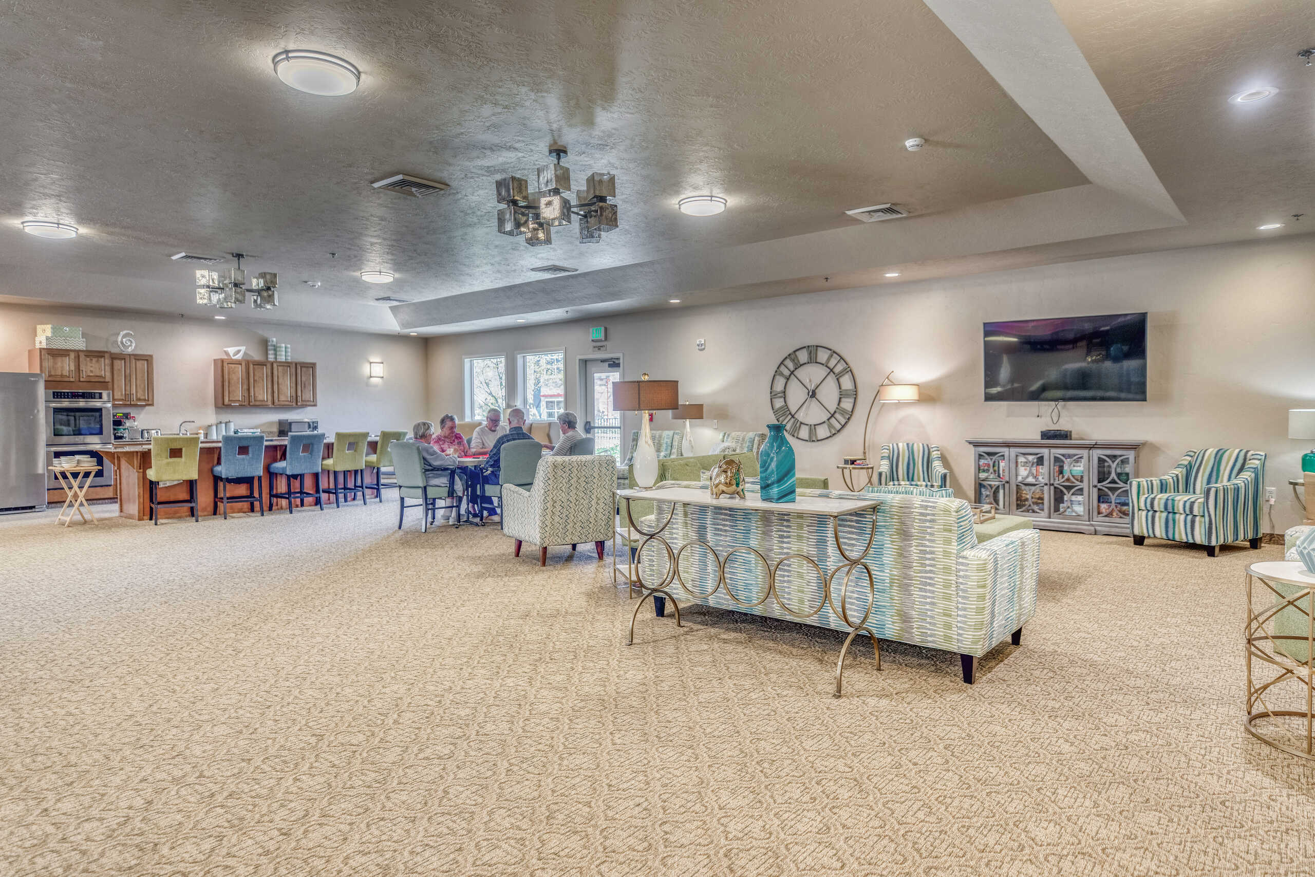 Residents enjoying social time in a common area