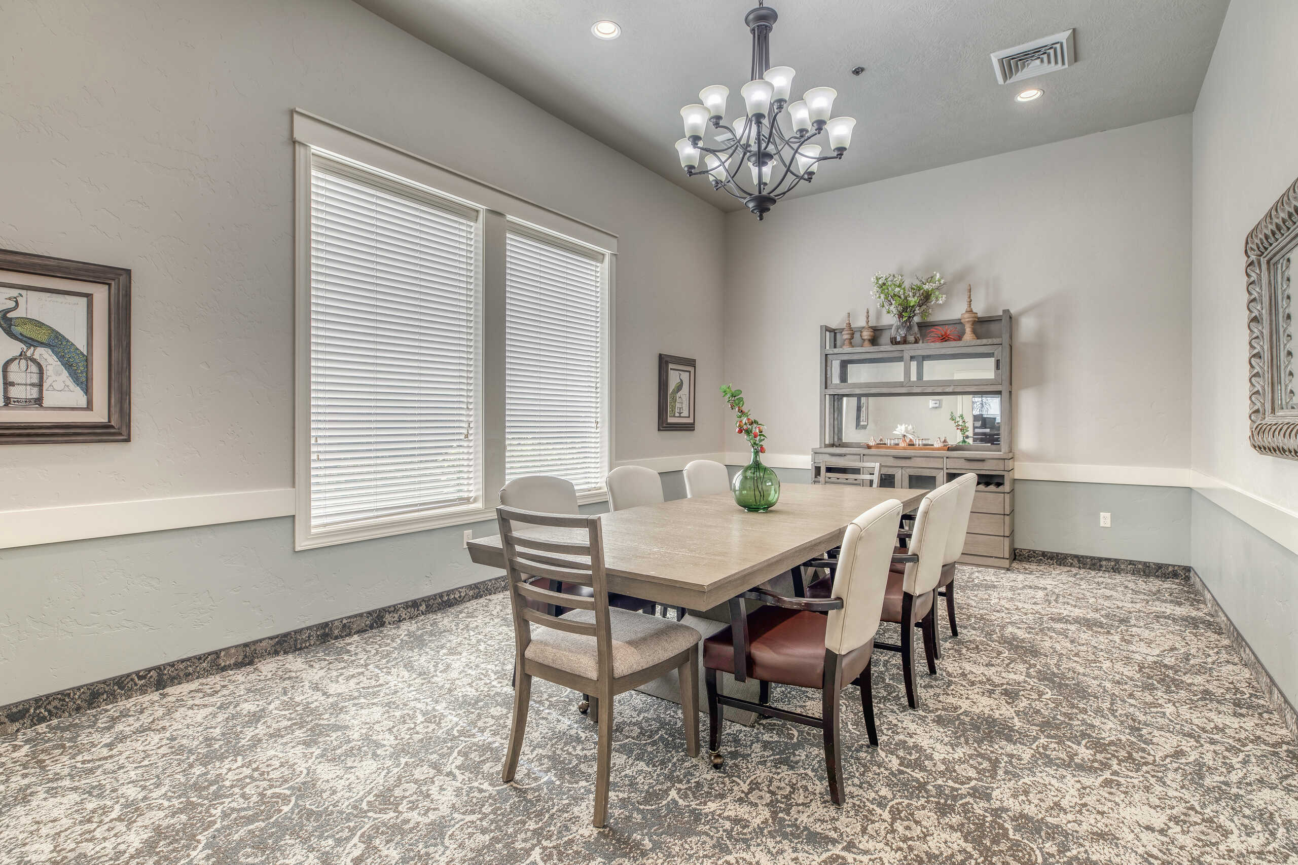 Bright common area with dining table and decor